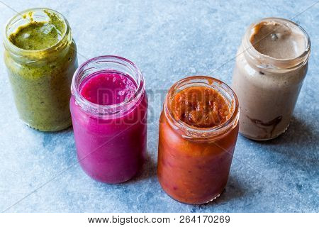 Jar Of Beet Dip Sauce, Almond Butter Or Tahini Pistachio Urbech And Salsa (tomato Paste) Sauce