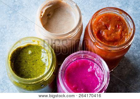Jar Of Beet Dip Sauce, Almond Butter Or Tahini Pistachio Urbech And Salsa (tomato Paste) Sauce