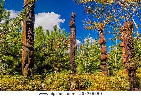 Samcheok, South Korea; September 25, 2018: Closeup Of Wooden Statues Shaped Like Human Penis Standin