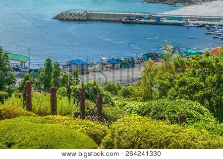 Samcheok, South Korea; September 25, 2018: Penis Shaped Statues In Public Garden Overlooking Ocean W