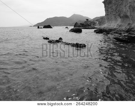 Tibuda Island And Waves And Rocks