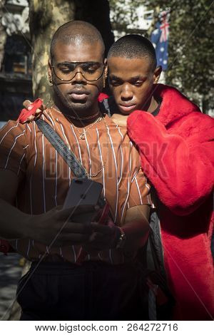 Two Friends Take A Selfie On The Phone