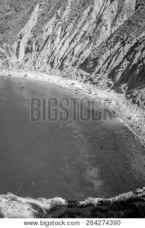 Jebha Island And Waves And Rocks