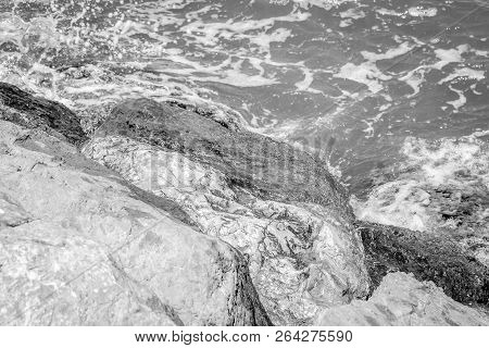 Jebha Island And Waves And Rocks