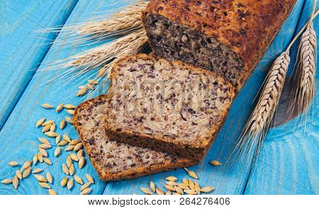 Multi-grain Bread On A Wooden Background. Healthy Food Concept.