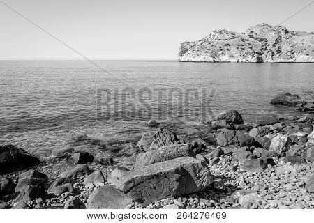 Jebha Island And Waves And Rocks