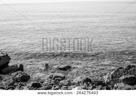 Jebha Island And Waves And Rocks
