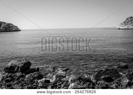 Jebha Island And Waves And Rocks