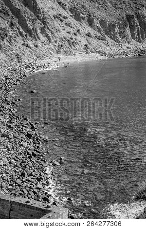 Jebha Island And Waves And Rocks