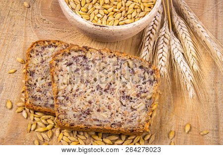 Multi-grain Bread On A Wooden Background. Healthy Food Concept.