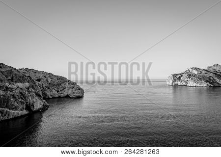 Jebha Island And Waves And Rocks