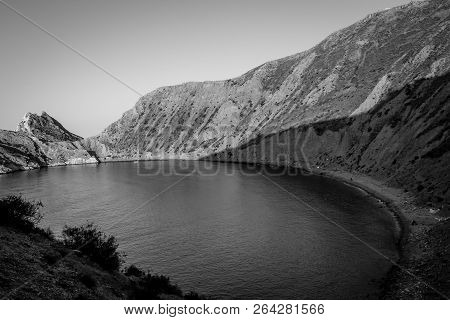 Jebha Island And Waves And Rocks