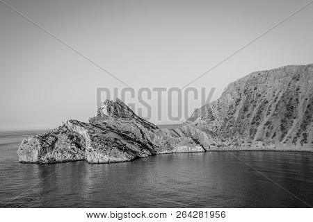 Jebha Island And Waves And Rocks