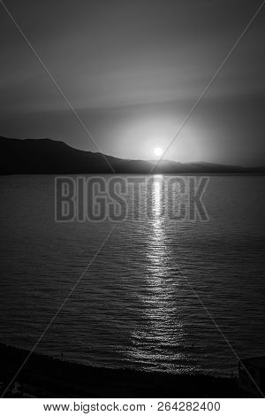 Jebha Sunset Island And Waves And Rocks