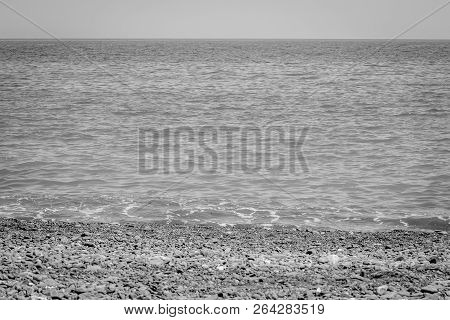 Jebha Island And Waves And Rocks