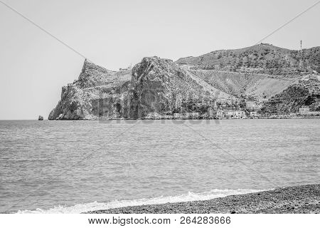 Jebha Island And Waves And Rocks
