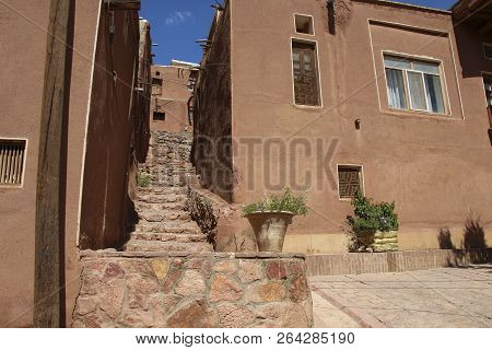 Mountain Village Abyaneh With Characteristic Red Houses In Central Part Of Iran. Unesco World Herita