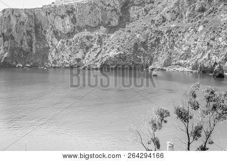 Houcima Beach And Waves And Rocks