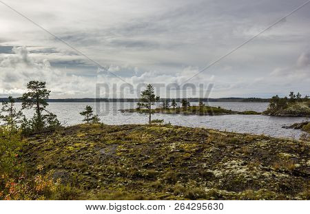 Skerries And Lake Ladoga In Karelia Digital Photo Moss On Rock Heavy Sky Autumn Landscape
