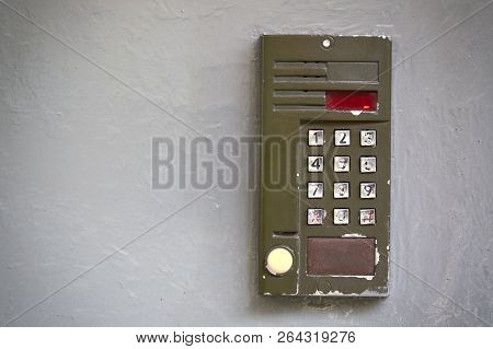 Old Digital Doorphone On Gray Flat Surface