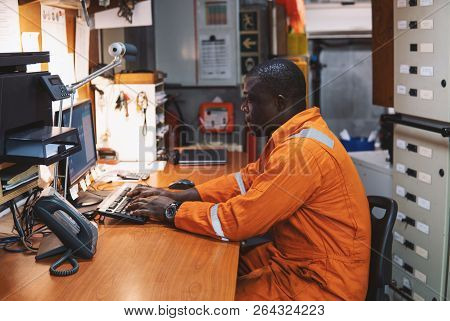 Marine Engineer Officer Working In Engine Room
