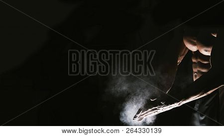Image Of Man-s Hands With Talcum Powder