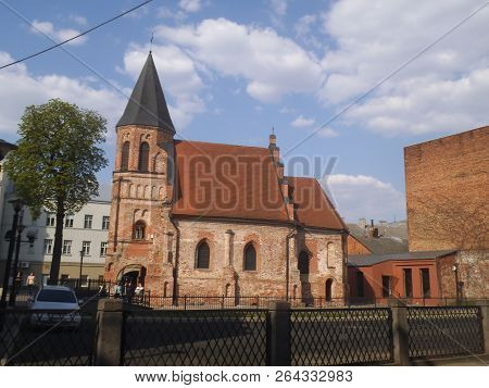 St Gertrude Church In Kaunas.
The Church Of St. Gertrude With People On The Entrance Is Shown. A Bla