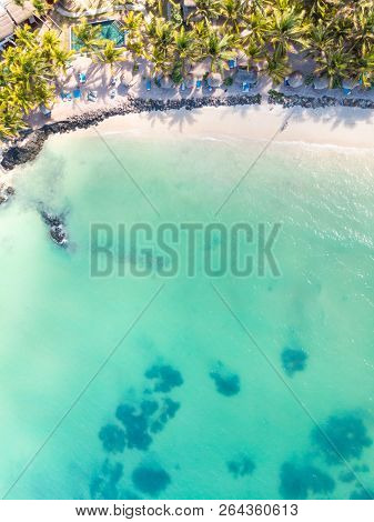 Aerial View Of Amazing Tropical White Sandy Beach With Palm Leaves Umbrellas And Turquoise Sea, Maur