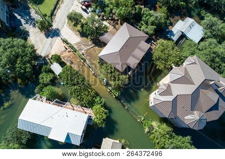Straight Down Aerial Drone Angle Above Flooded Mansion Homes And Luxury Houses And Rooftops Above Th