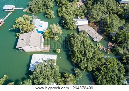 Straight Down Aerial Drone Angle Above Flooded Homes And Houses And Rooftops Above The Flood Waters 