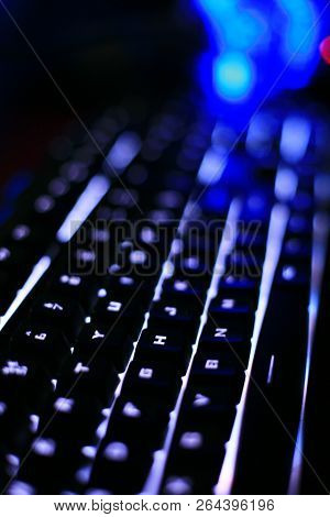Computer Illuminated Rgb Keyboard Isolated In The Dark