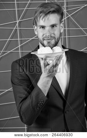 Man Formal Elegant Suit Hold Plate With Sweet Marshmallow Dessert. Bachelor Elegant Guy Offer Sweet 