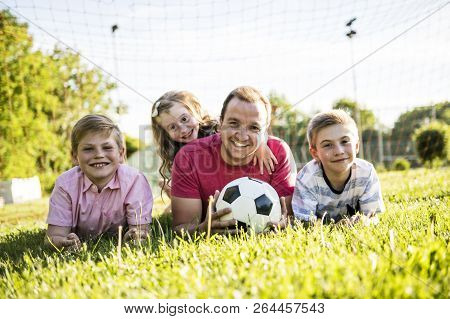 Cute Happy Family Lifestyle Play Soccer Outside