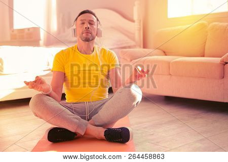 Peaceful Relaxed Man Listening To The Music