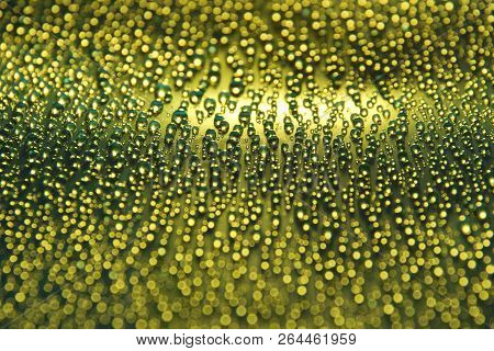 Water Drops Abstract Festive Gold Yellow Background Close Up
