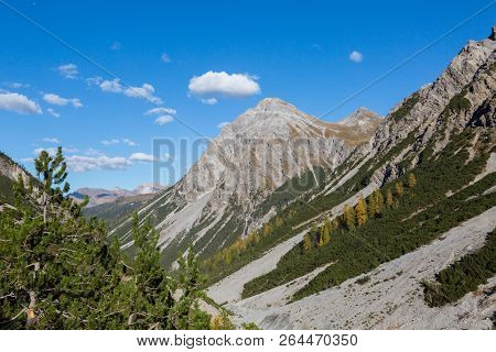 Schiesshorn Mountain With Clouds In Blue Sky, Welschtobel Canyon, Forest