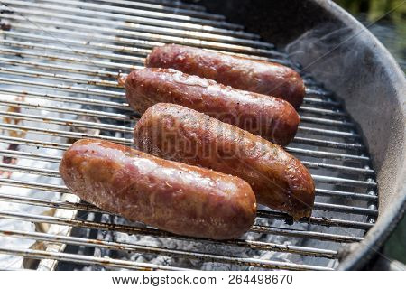 Sausages Cook On The Grill