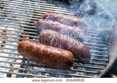 Sausages Cook On The Grill