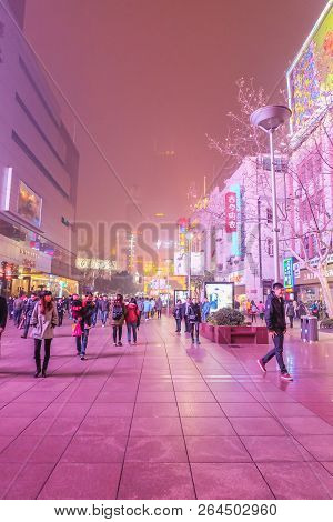 Shanghai/china -  January 24 2015: Night Life Of People Walking In Nanjing Road Walking Street In Sh