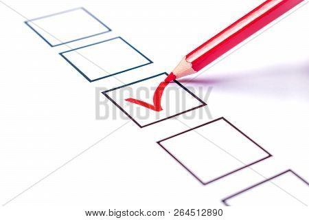 Bulletin And A Red Pencil Voting For Candidate.