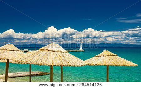 View Of Blue Paradise Water Of Toroneos Kolpos Gulf, Blue Sky, White Clouds Over Sithonia Peninsula,