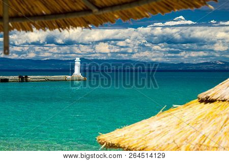 View Of Blue Paradise Water Of Toroneos Kolpos Gulf, Blue Sky, White Clouds Over Sithonia Peninsula,