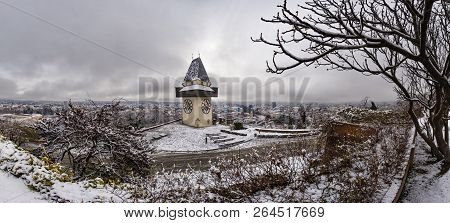 Landmark Uhrturm On Hill Schlossberg In Graz On A Snowy Winterday