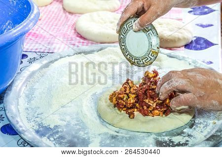 Coocing The Traditional Georgian Dish Kubdari With Meat, Svaneti