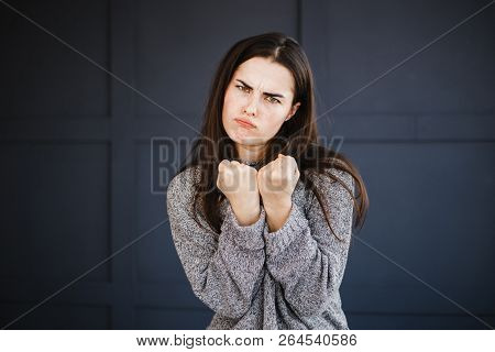 Emotions, Feelings And Face Expression. Furious Angry Woman In Rage Clenches Fists. Anger And Fury, 