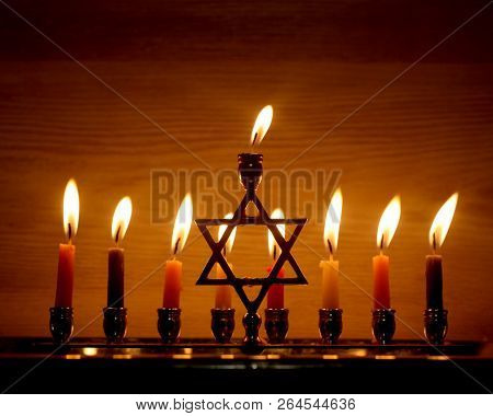 Hanukkah Is A Jewish Holiday. Burning Chanukah Candlestick With Candles. Chanukiah Menorah.