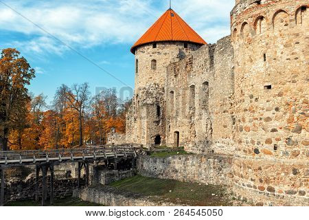 Autumn Park With Ruins Of Medieval Castle In Cesis Town, Latvia