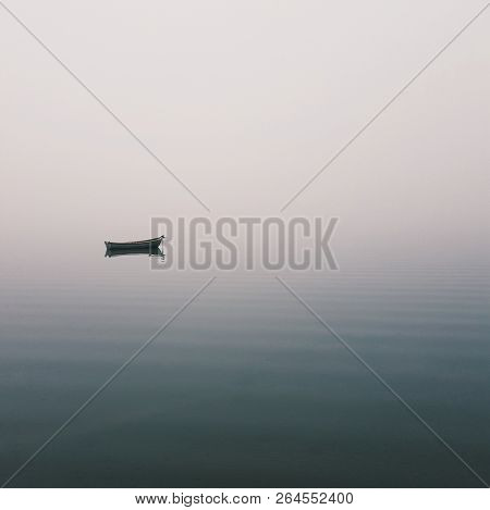 Mistic Lonely Boat In The Middle Of The Lake, Mist Fog