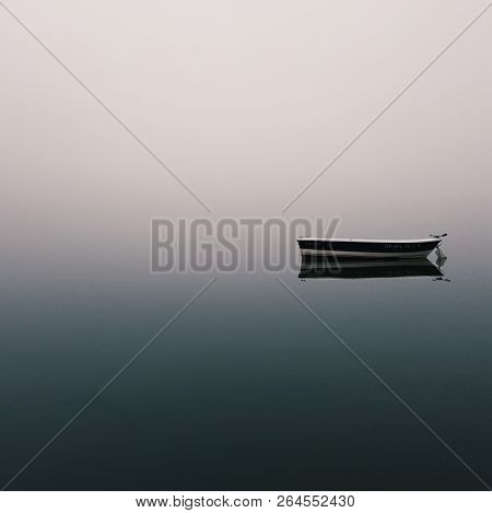 Mistic Lonely Boat In The Middle Of The Lake, Mist Fog