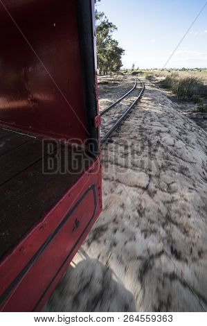 Mini-train At Barril Beach That Transports Visitors From The Mainland To The Beach, Tavira, Portugal